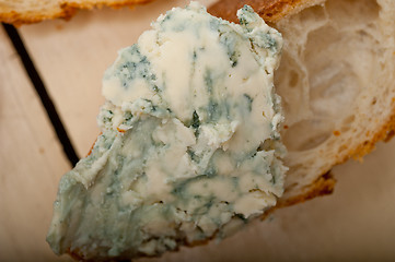 Image showing fresh blue cheese spread ove french baguette