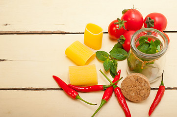 Image showing Italian pasta paccheri with tomato mint and chili pepper