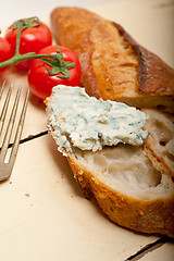 Image showing fresh blue cheese spread ove french baguette