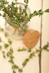 Image showing fresh thyme on a glass jar