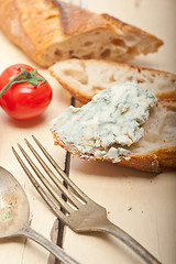 Image showing fresh blue cheese spread ove french baguette