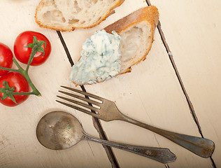 Image showing fresh blue cheese spread ove french baguette