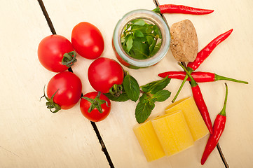 Image showing Italian pasta paccheri with tomato mint and chili pepper