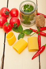 Image showing Italian pasta paccheri with tomato mint and chili pepper