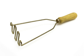 Image showing pestle for preparation of potatoes the kitchen tool on a white background