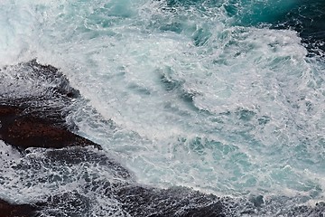 Image showing Waves hitting shore