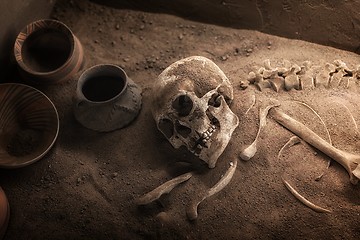 Image showing Ancient skeleton lying in grave