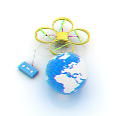 Image showing Quadrocopter Drone with Earth Globe and remote controller on a w