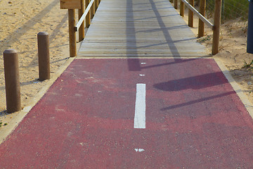 Image showing Red bicycle path