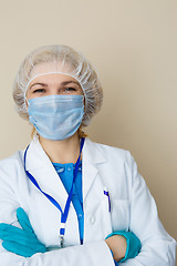 Image showing Young girl in mask, gloves