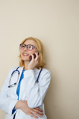 Image showing Young woman talking on phone