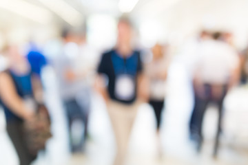 Image showing Abstract blurred people socializing during coffee break at business conference.