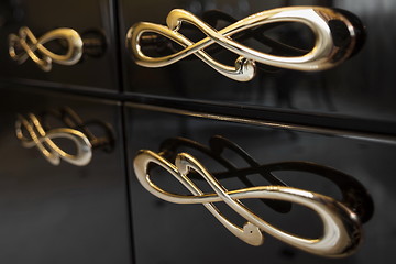 Image showing curves furniture handles