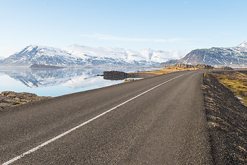 Image showing Asphalt road among mountains in Iceland