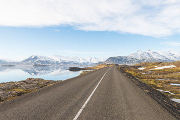 Image showing Asphalt road among mountains in Iceland