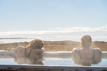 Image showing Icelandic hotpot among the amazing lagoon and mountains