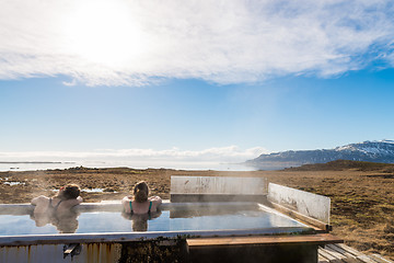 Image showing Icelandic hotpot among the amazing lagoon and mountains