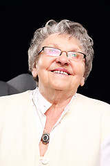 Image showing Smiling grandmother Cheerful, smiling old woman sitting in the chair 