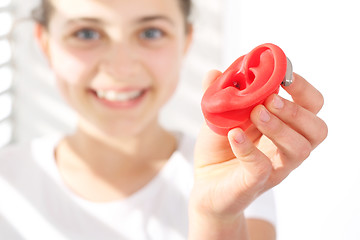 Image showing The hearing aid for a child. The choice of hearing aid hearing care professional