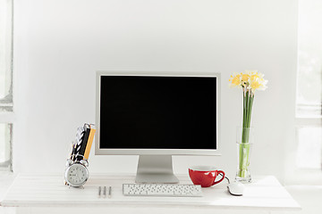 Image showing Stylish workspace with computer at home or studio