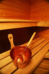 Image showing Interior of sauna, bucket and scoop