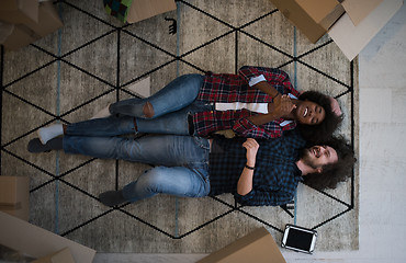 Image showing Top view of attractive young multiethnic couple
