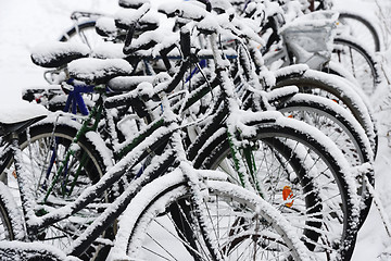 Image showing bikes covered with a blanket of snow, winter in Finland