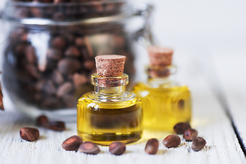 Image showing The cedar oil in a glass bottle