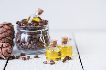 Image showing The cedar oil in a glass bottle