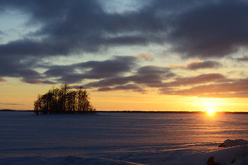 Image showing sunset on the lake in winter, Finland