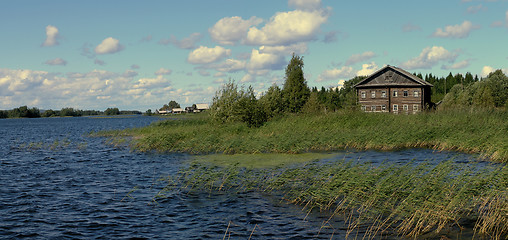 Image showing traditional wooden house on the shore of Lake Onega, Russia