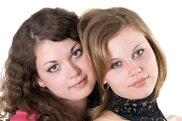 Image showing Portrait of the two beauty young women. Isolated. 2