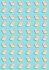 Image showing white marshmallows on a blue background. geometric pattern of white marshmallows. top view