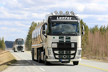 Image showing Two Volvo FH Semi Tank Trucks Convoy along Road