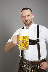 Image showing young bavarian with a beer