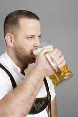 Image showing young bavarian with a beer