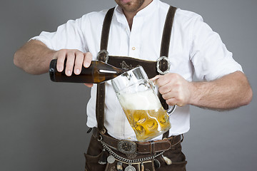 Image showing young bavarian with a beer