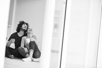 Image showing young couple in their new home