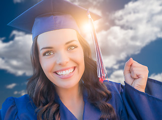 Image showing Happy Graduating Mixed Race Woman In Cap and Gown