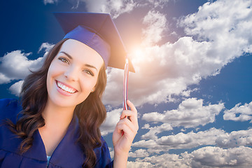 Image showing Happy Graduating Mixed Race Woman In Cap and Gown