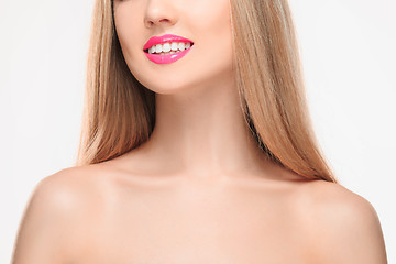 Image showing The sensual red lips, mouth open, white teeth.