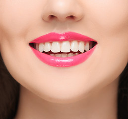 Image showing The sensual red lips, mouth open, white teeth.