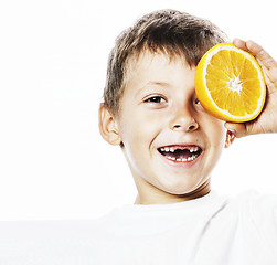 Image showing little cute boy with orange fruit double isolated on white smili