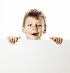 Image showing little cute boy holding empty shit to copyspace isolated close u