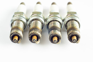 Image showing Set of damaged spark plugs