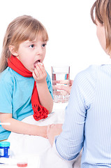 Image showing Sick little girl in bed