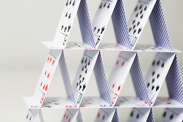 Image showing house of playing cards over white background