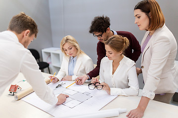 Image showing business team discussing house project at office