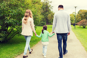 Image showing happy family walking in summer park