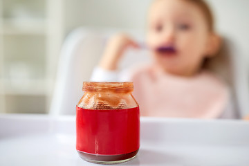 Image showing jar of baby food on table at home